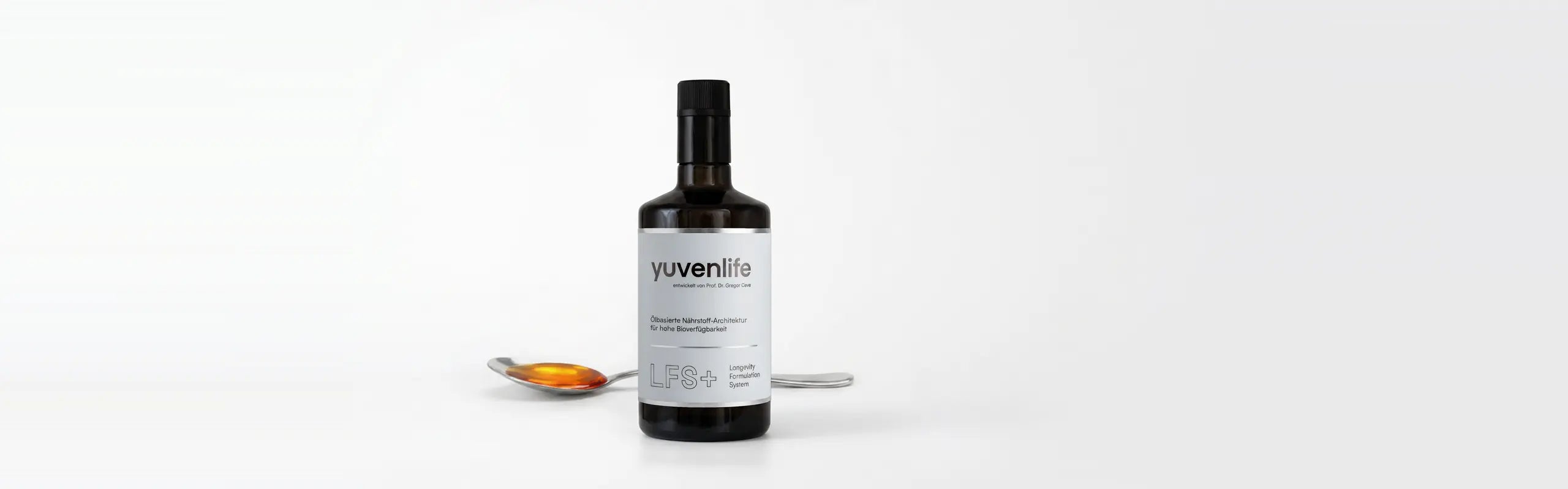 yuvenlife Flasche mit zwei Löffeln goldenen Öls
